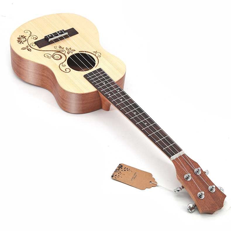 Spruce and sapele ukulele with flower on body
