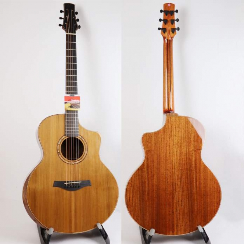 Solid cedar and walnut acoustic guitar