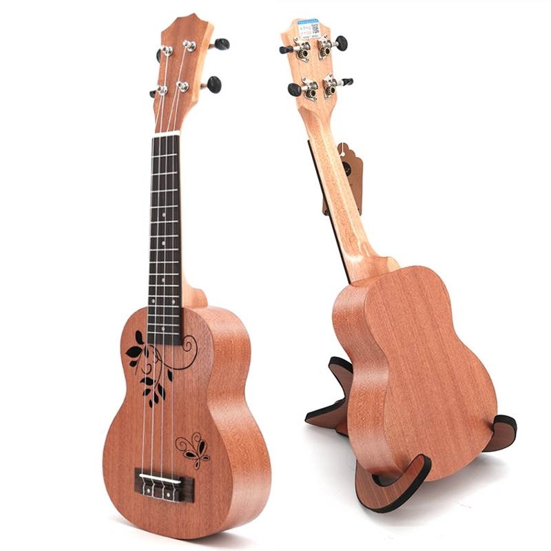 All sapele ukulele with flower engraving